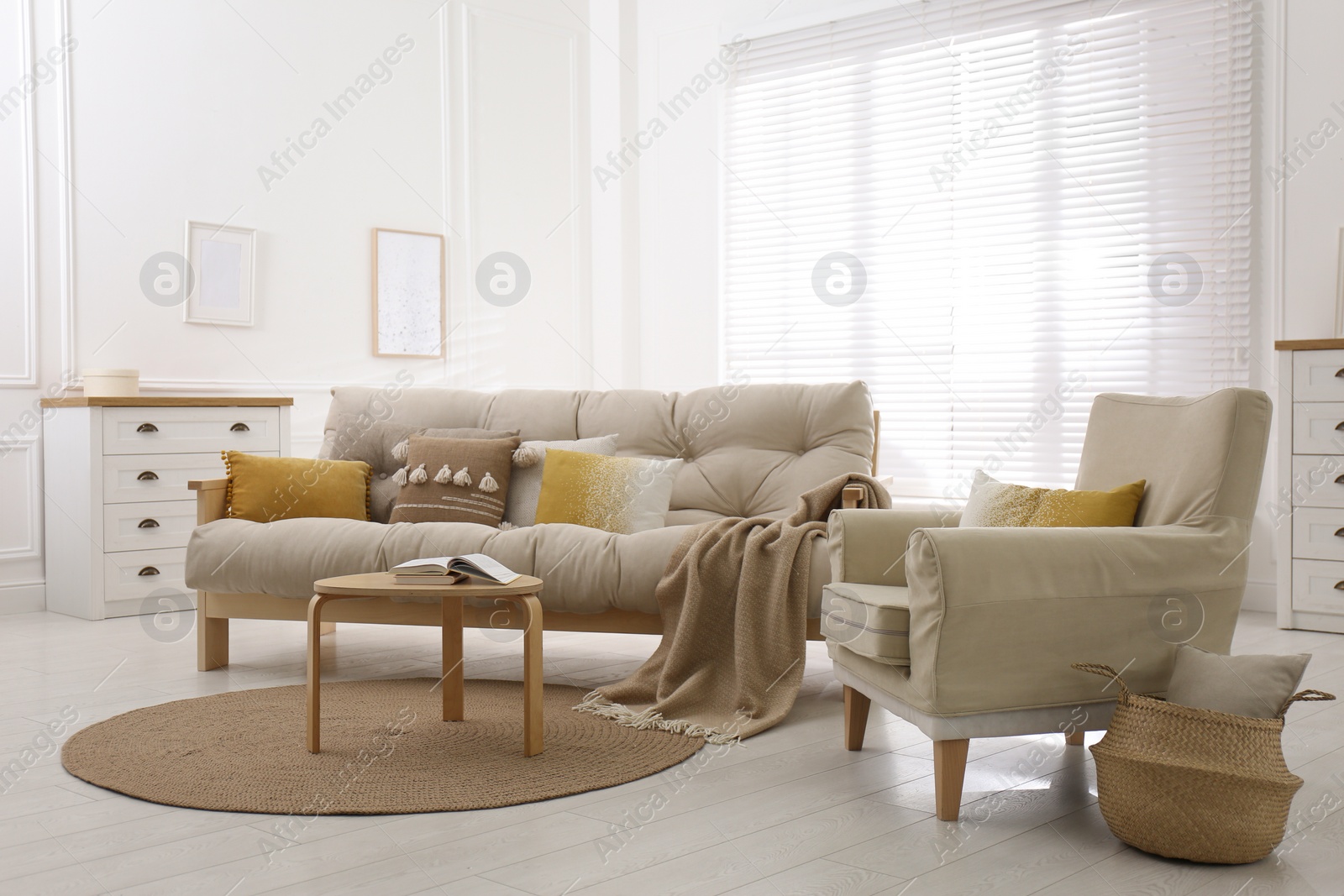 Photo of Stylish living room interior with comfortable sofa and armchair