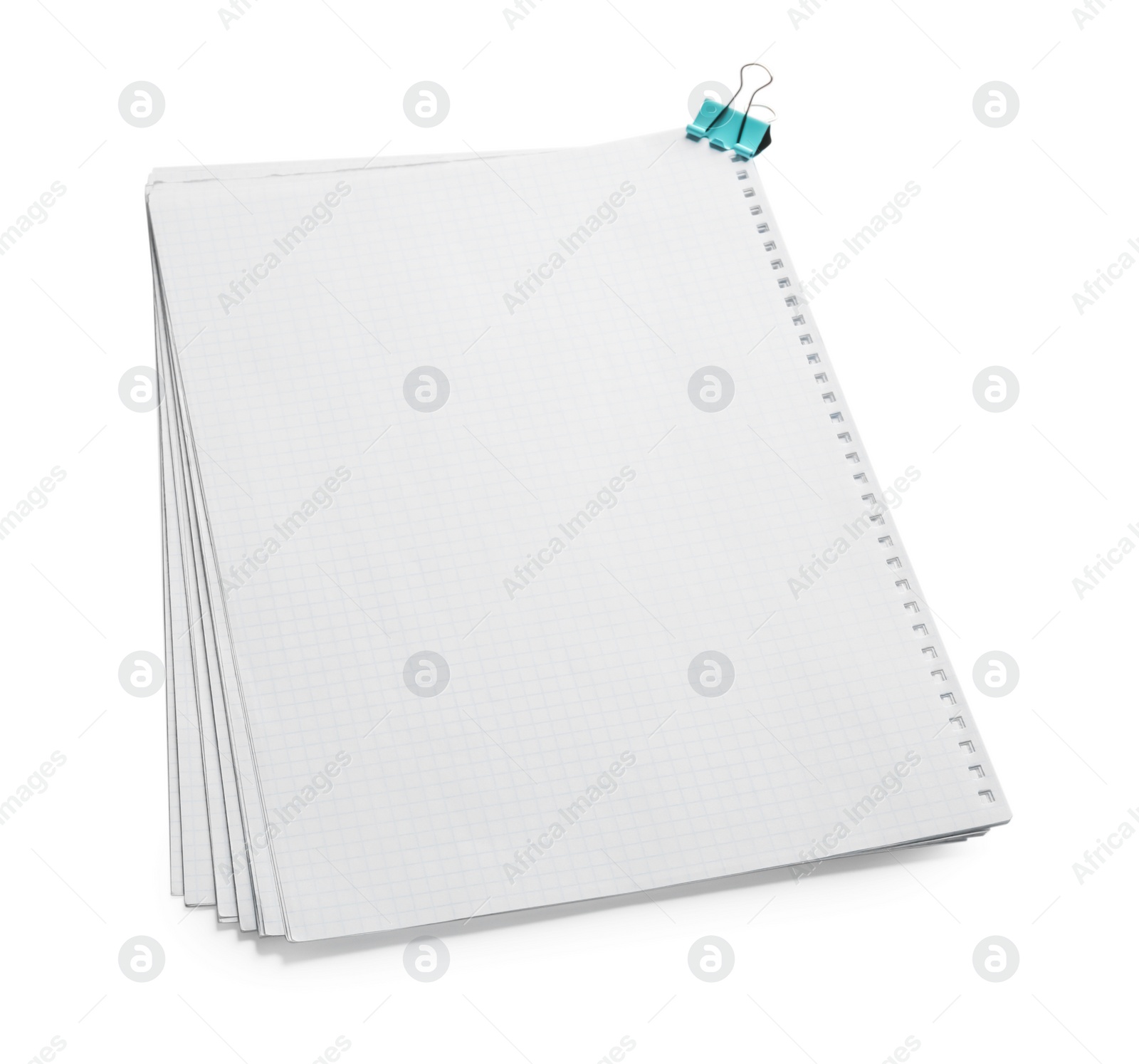 Photo of Stack of checkered paper sheets with binder clip on white background