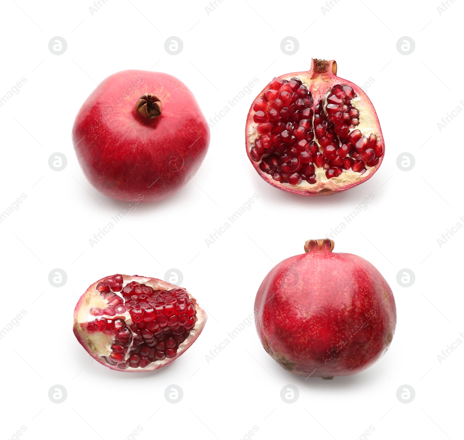 Photo of Ripe pomegranates on white background, flat lay. Delicious fruit