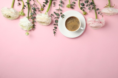 Flat lay composition with spring ranunculus flowers and cup of coffee on color background. Space for text