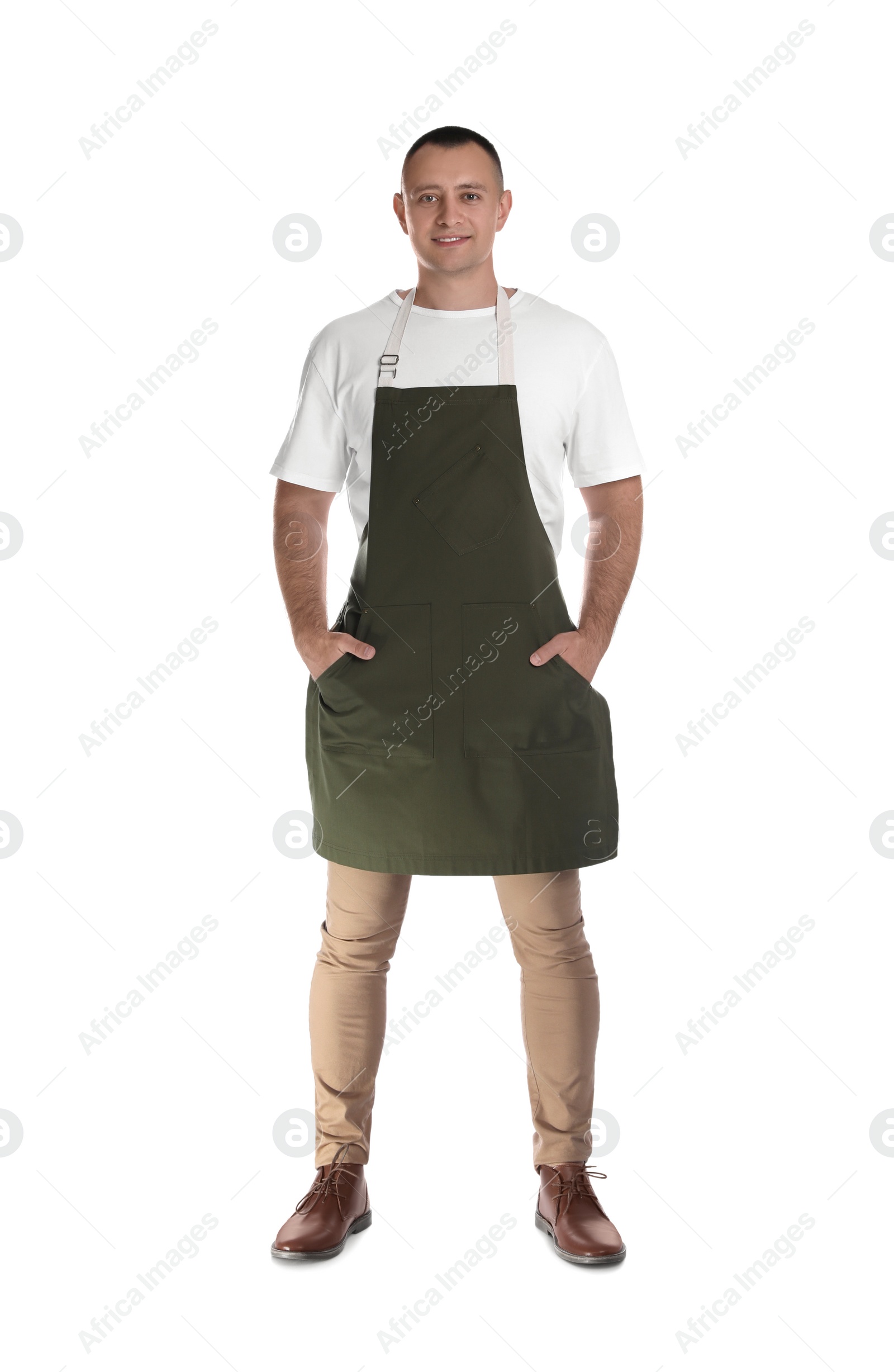 Photo of Full length portrait of happy young waiter in uniform on white background