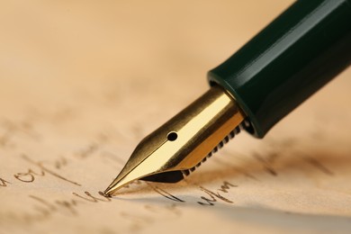 Writing letter with beautiful fountain pen, closeup