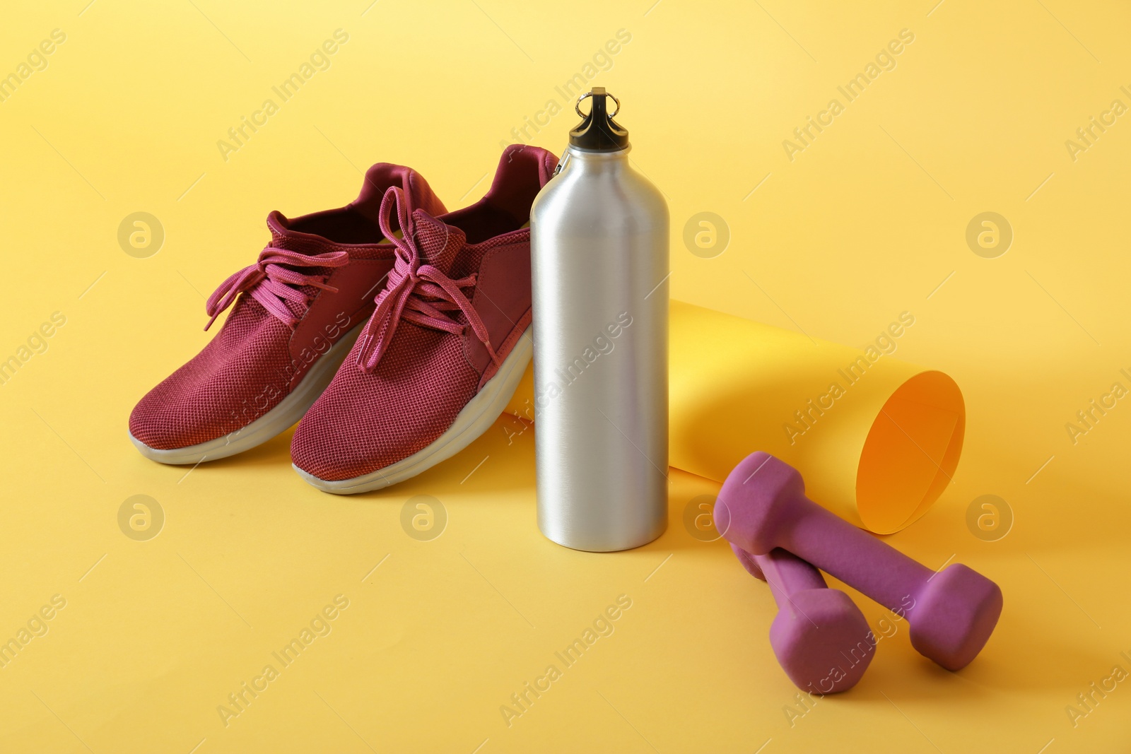 Photo of Fitness equipment on color background. Healthy lifestyle