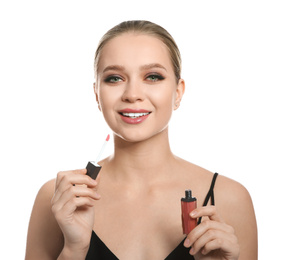 Photo of Beautiful woman with lip gloss on white background. Stylish makeup