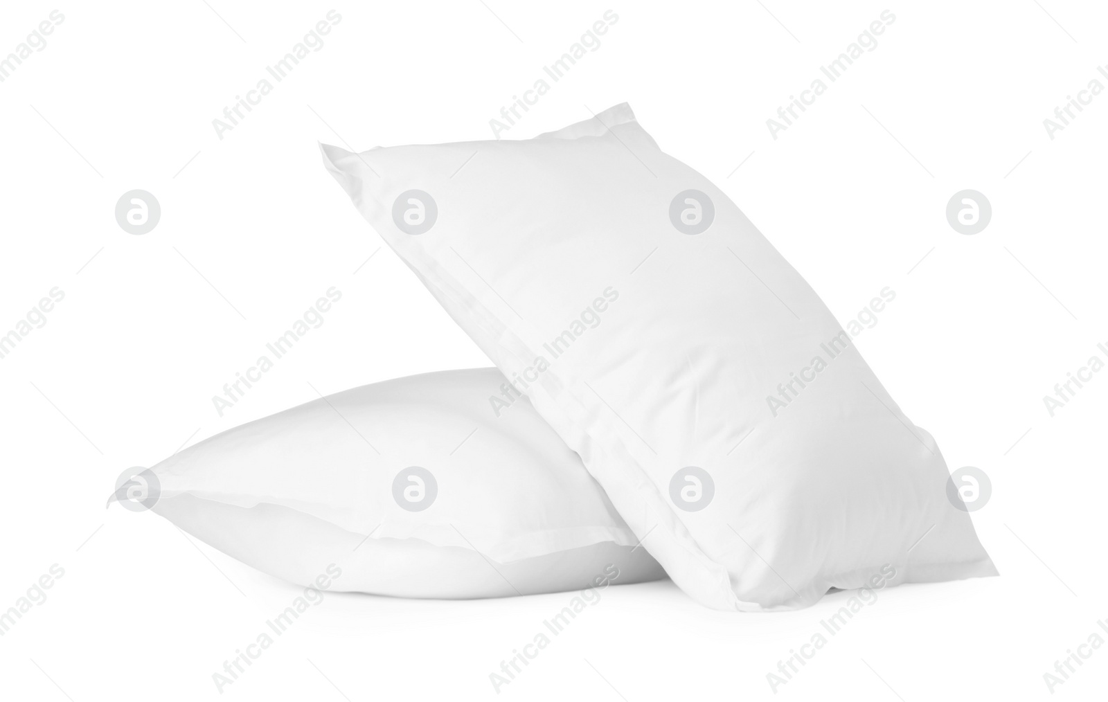 Photo of Two new soft pillows isolated on white