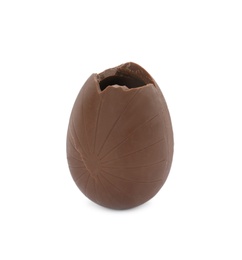 Photo of Broken milk chocolate egg on white background