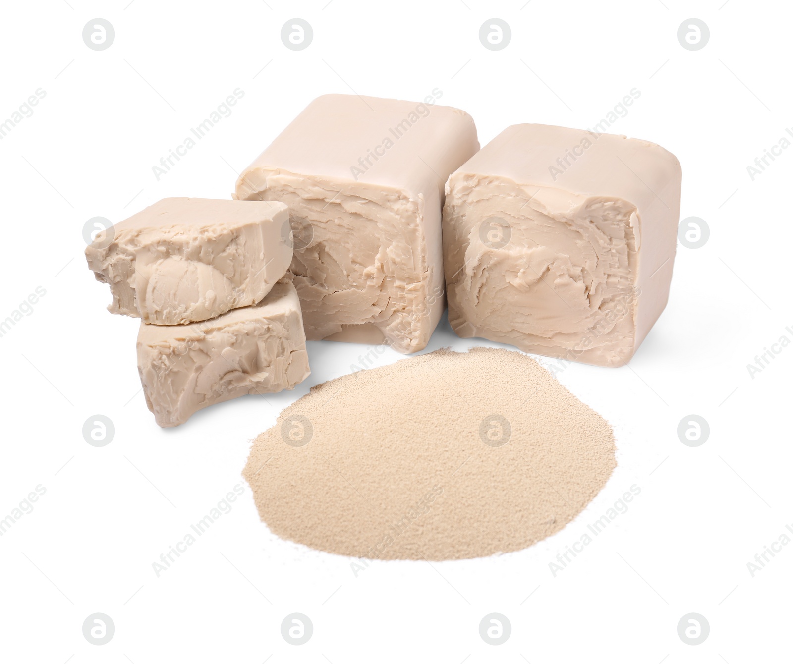 Photo of Compressed and granulated yeast isolated on white