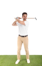 Photo of Young man playing golf on course against white background