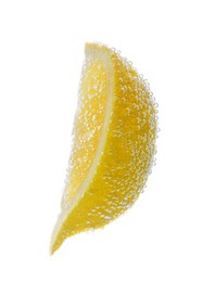 Photo of Slice of lemon in sparkling water on white background. Citrus soda