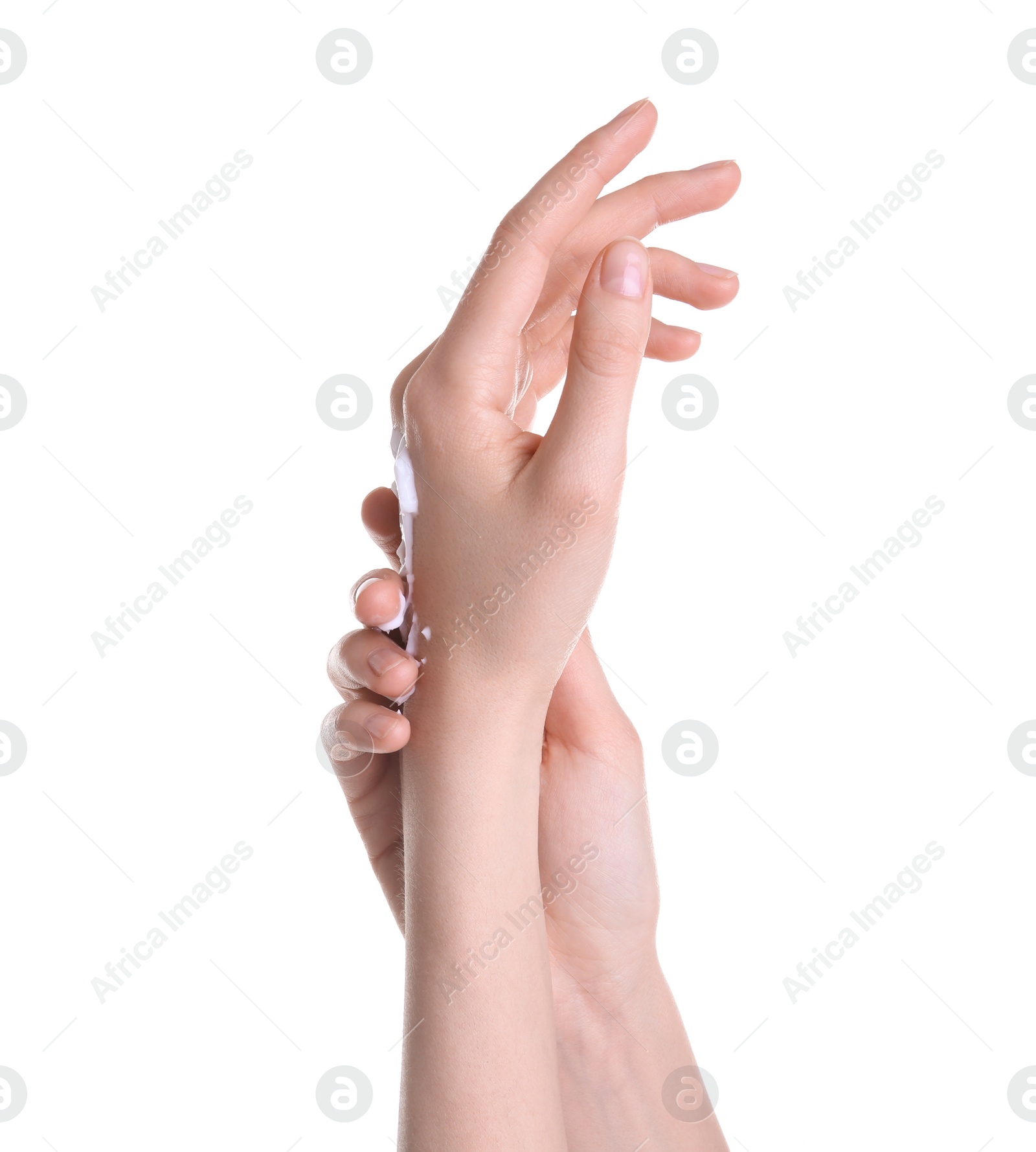 Photo of Young woman applying hand cream against on white background