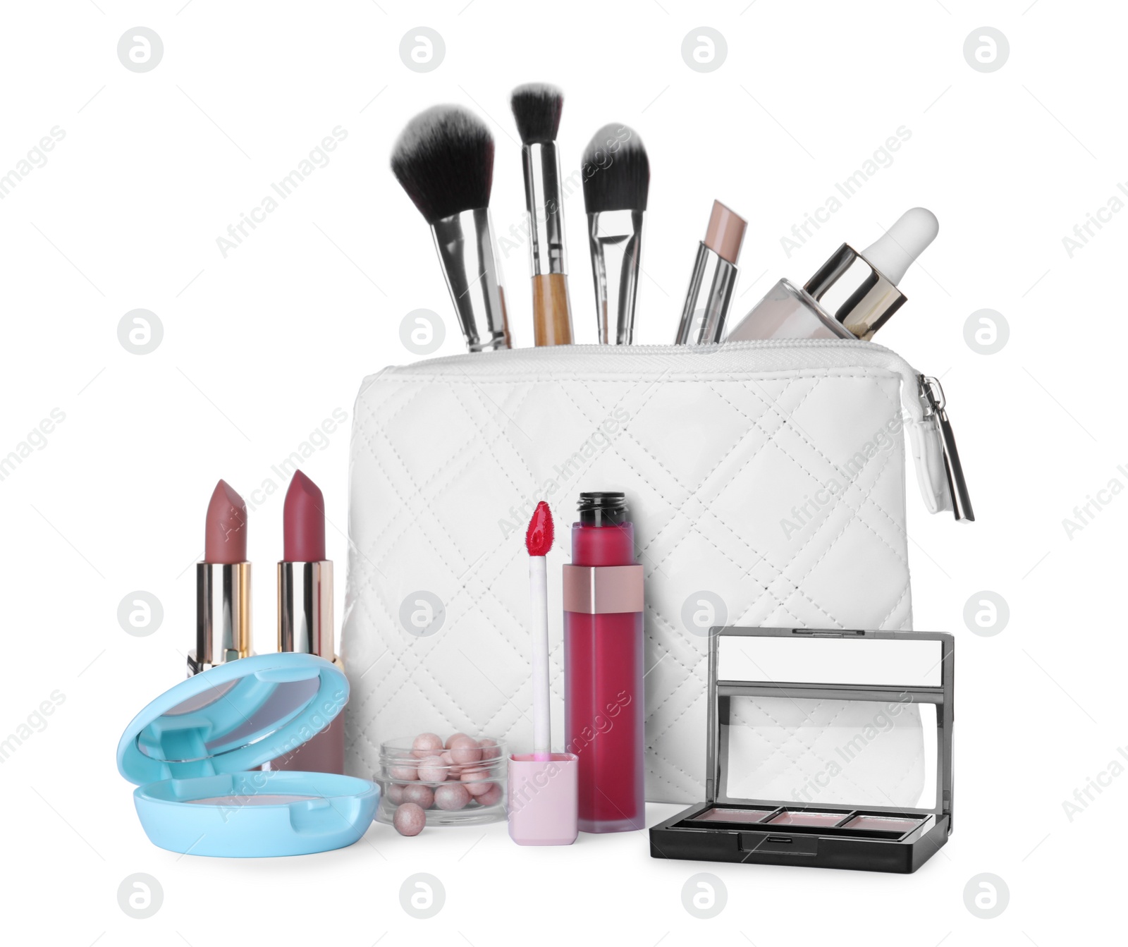 Photo of Different luxury decorative cosmetics, brushes and case on white background