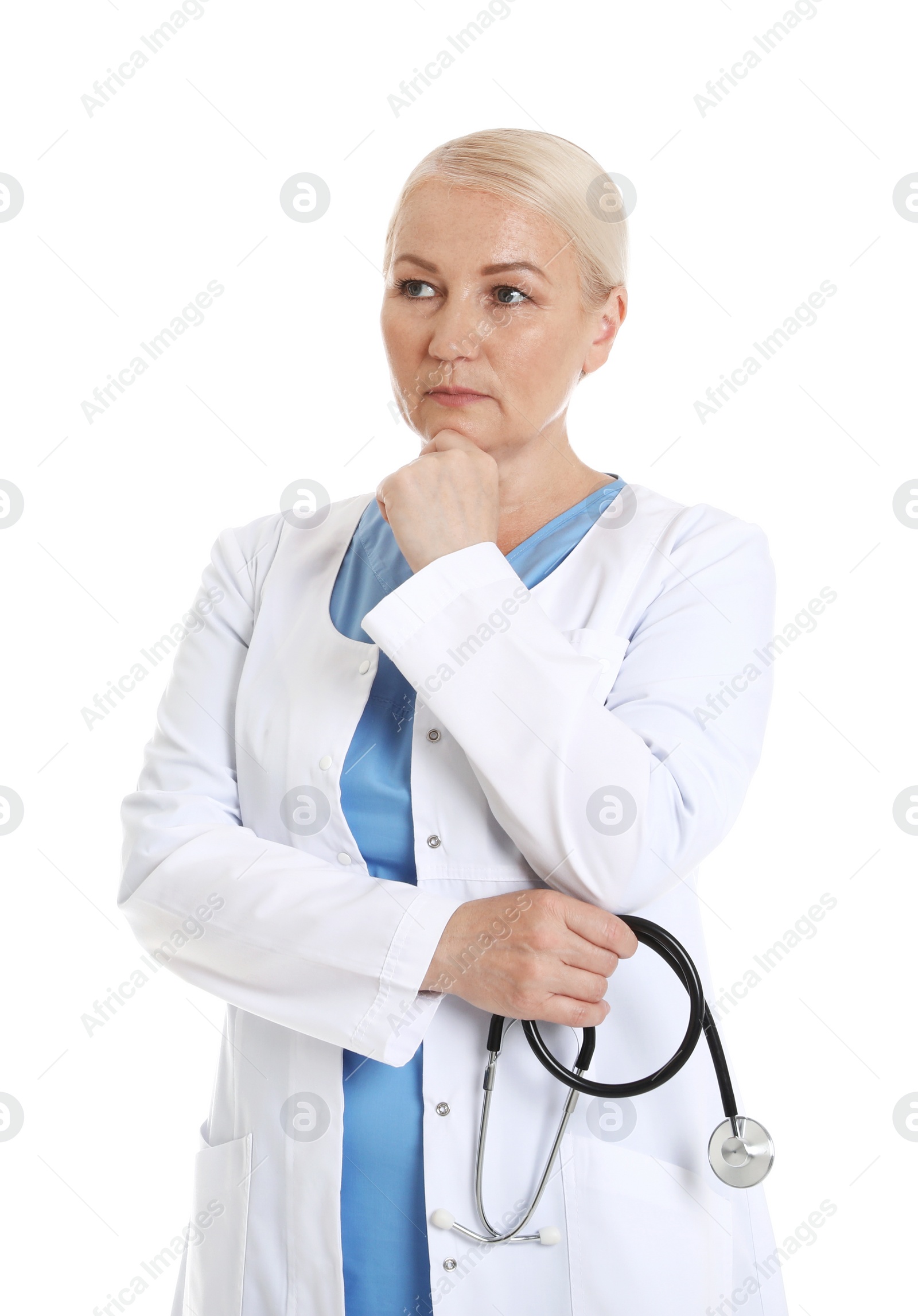 Photo of Portrait of pensive female doctor isolated on white. Medical staff