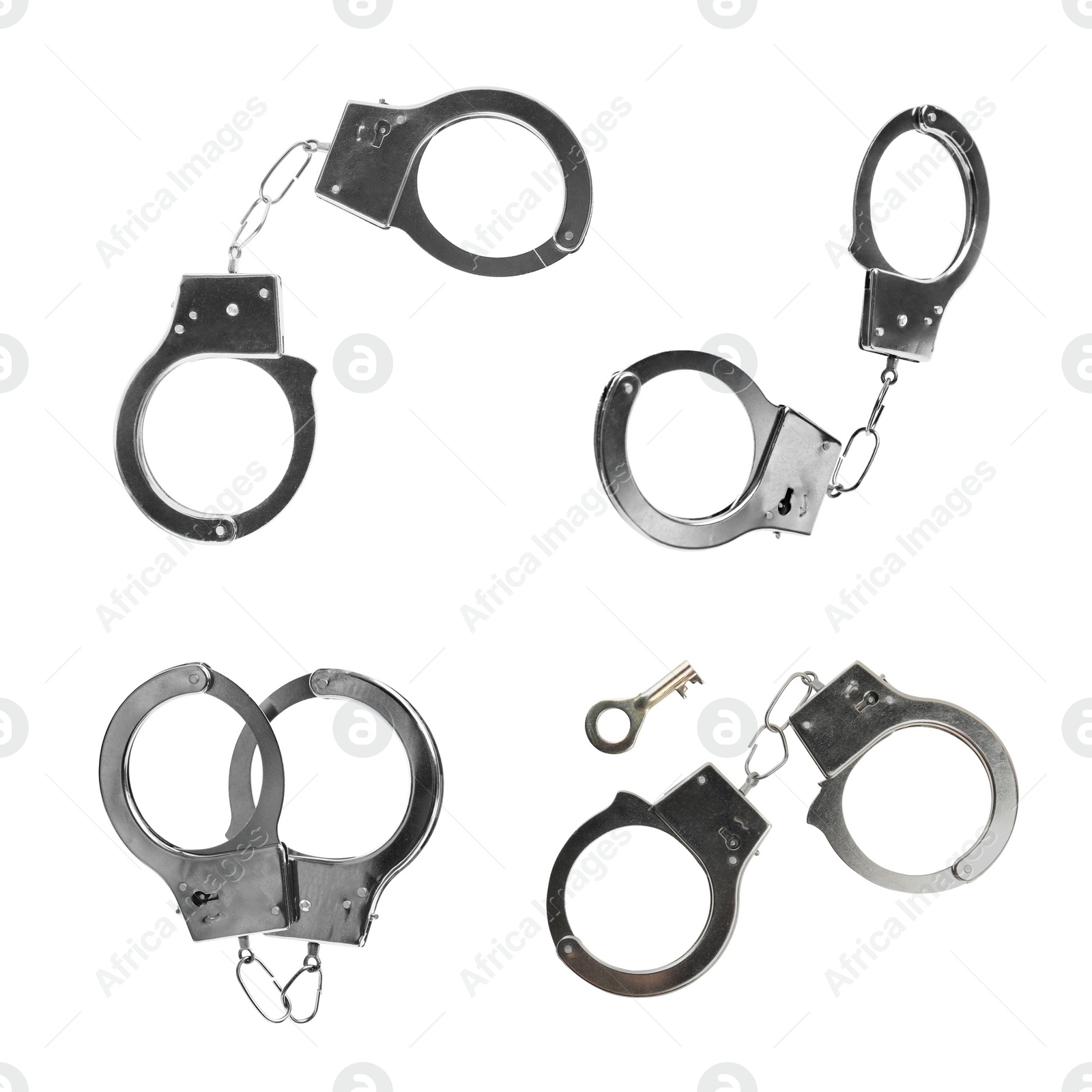 Image of Set with classic chain handcuffs on white background