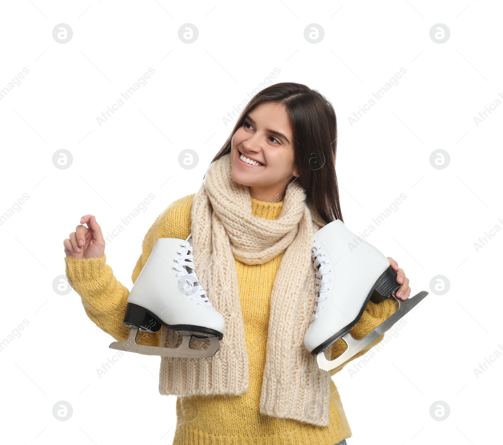 Photo of Happy woman with ice skates on white background