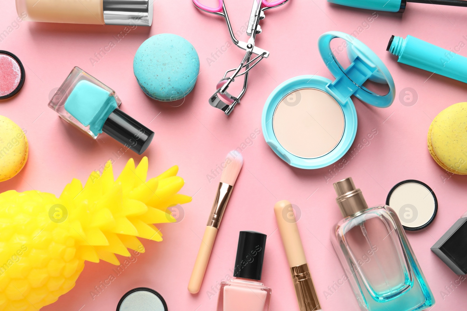 Photo of Flat lay composition with decorative cosmetics on color background