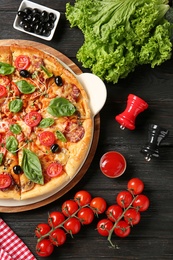 Flat lay composition with tasty homemade pizza on table