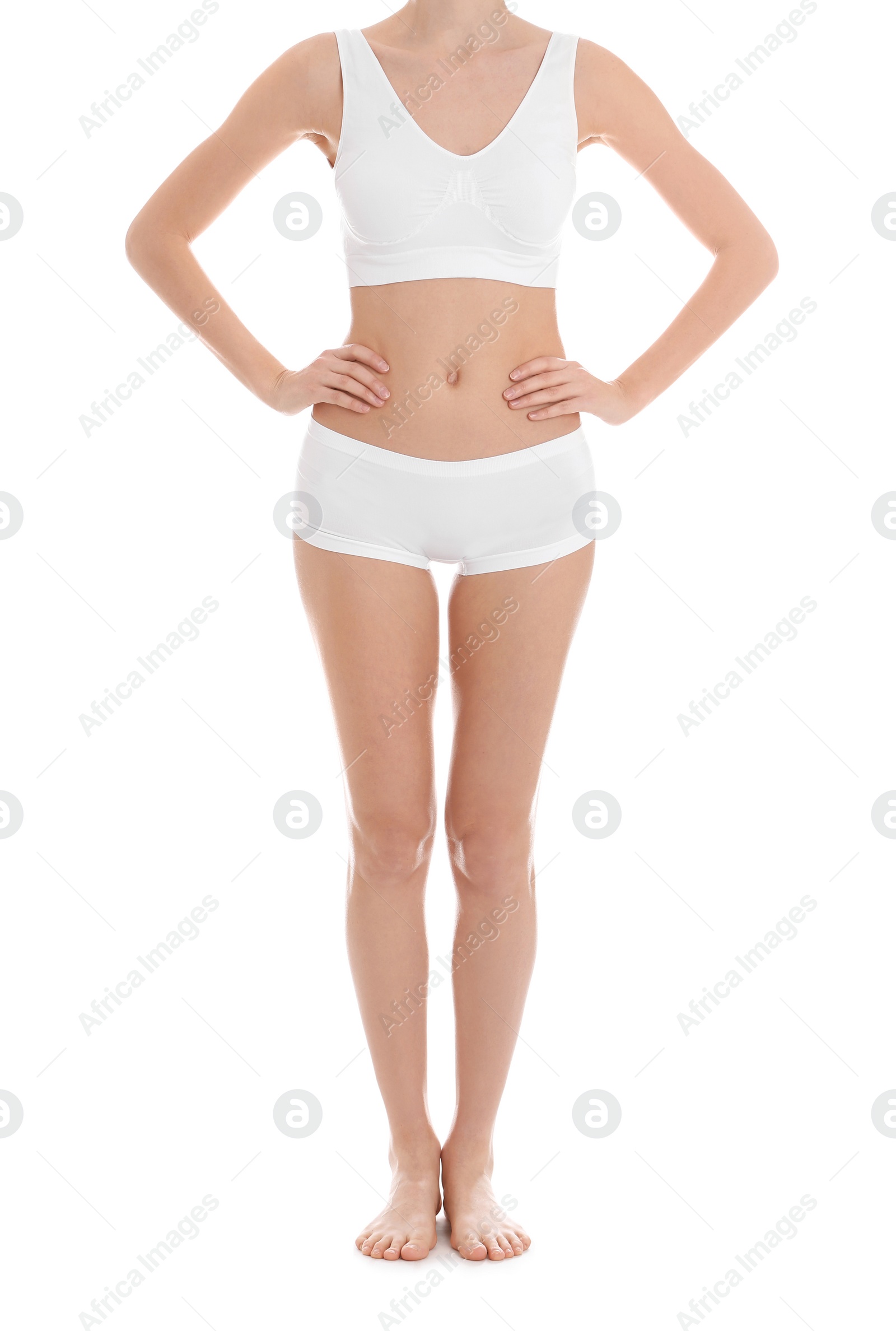 Photo of Young slim woman on white background, closeup. Weight loss