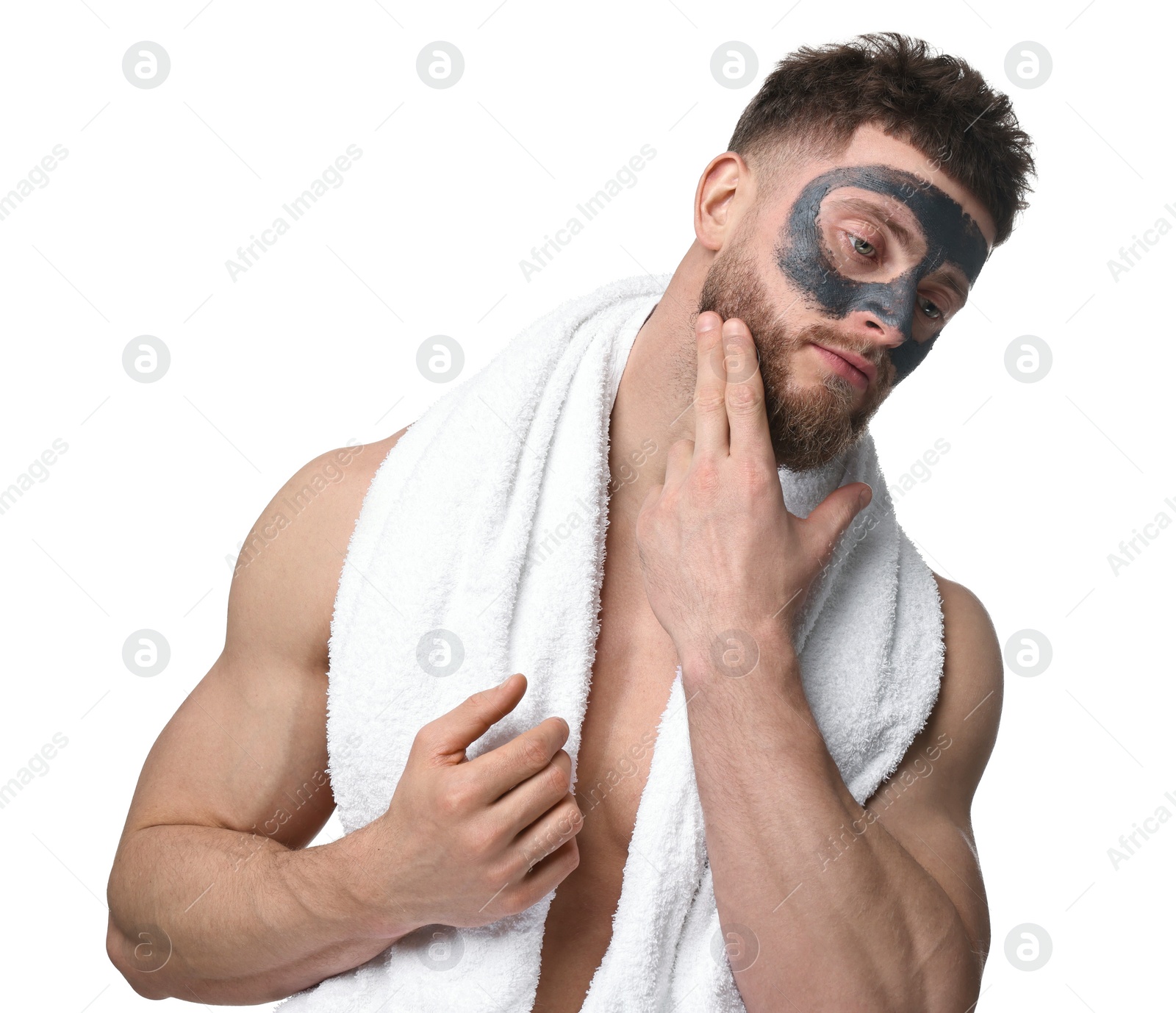 Photo of Handsome man with clay mask on his face against white background