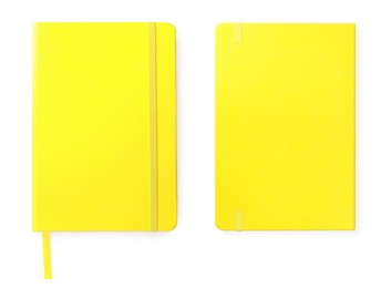 Image of Bright yellow notebooks on white background, top view