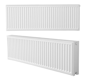 Modern panel radiators on white background. Heating system