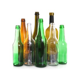 Photo of Many different glass bottles on white background. Recycling rubbish