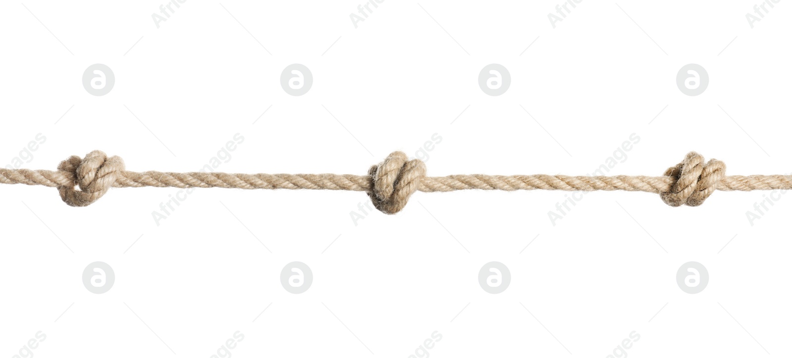 Photo of Rope with knots on white background. Simple design