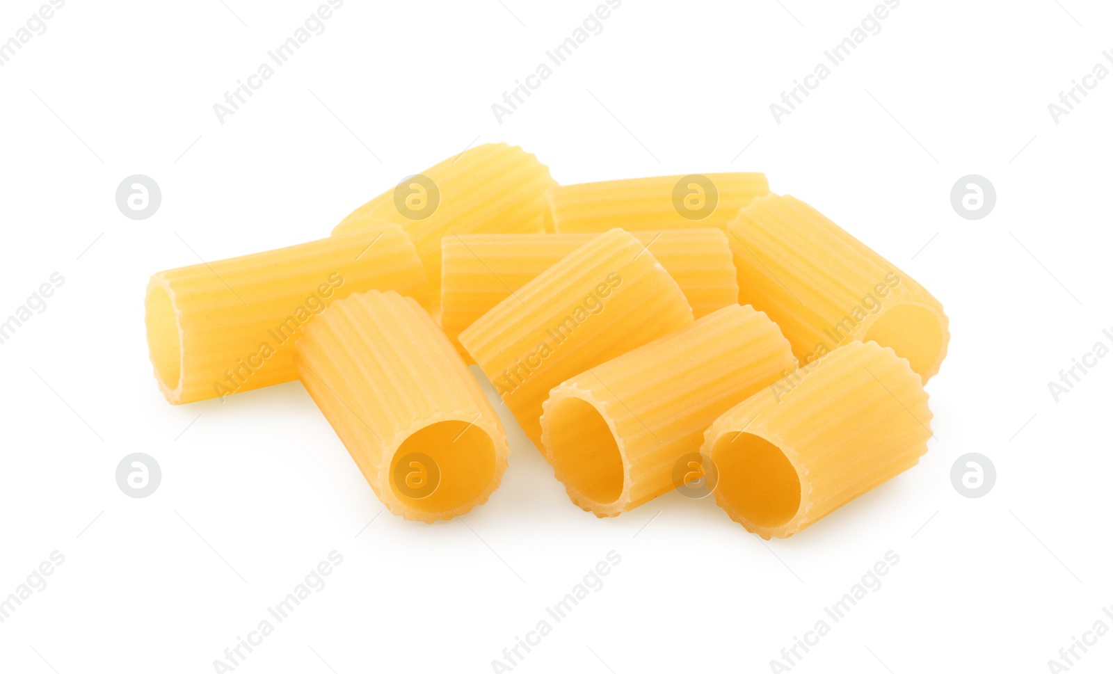 Photo of Pile of raw rigatoni pasta isolated on white