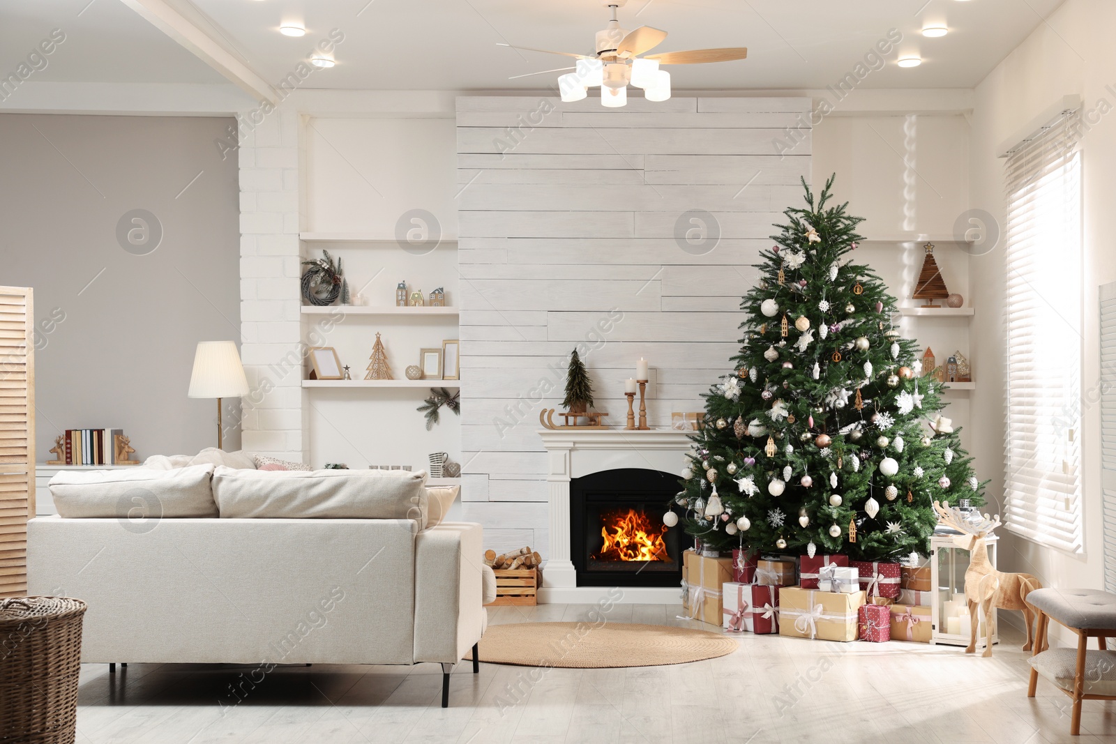 Photo of Festive living room interior with beautiful Christmas tree