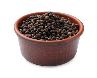 Photo of Aromatic spice. Many black peppercorns in bowl isolated on white