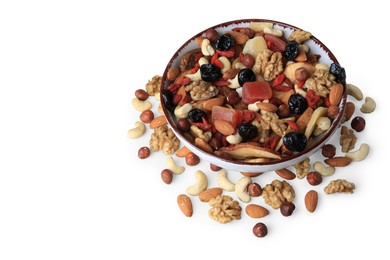 Bowl with mixed dried fruits and nuts on white background