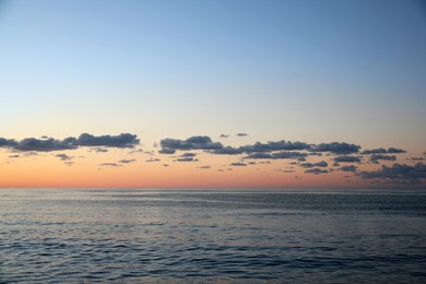 Photo of Picturesque viewsea under beautiful sky at sunset