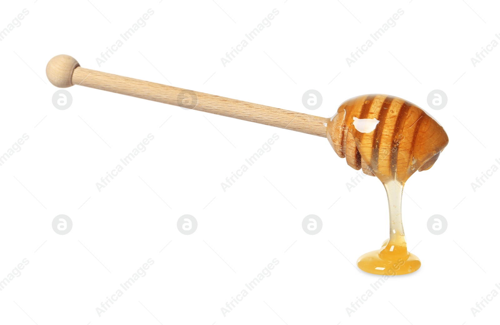 Photo of Natural honey dripping from dipper on white background