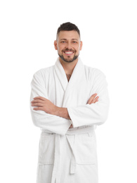 Handsome man wearing bathrobe on white background