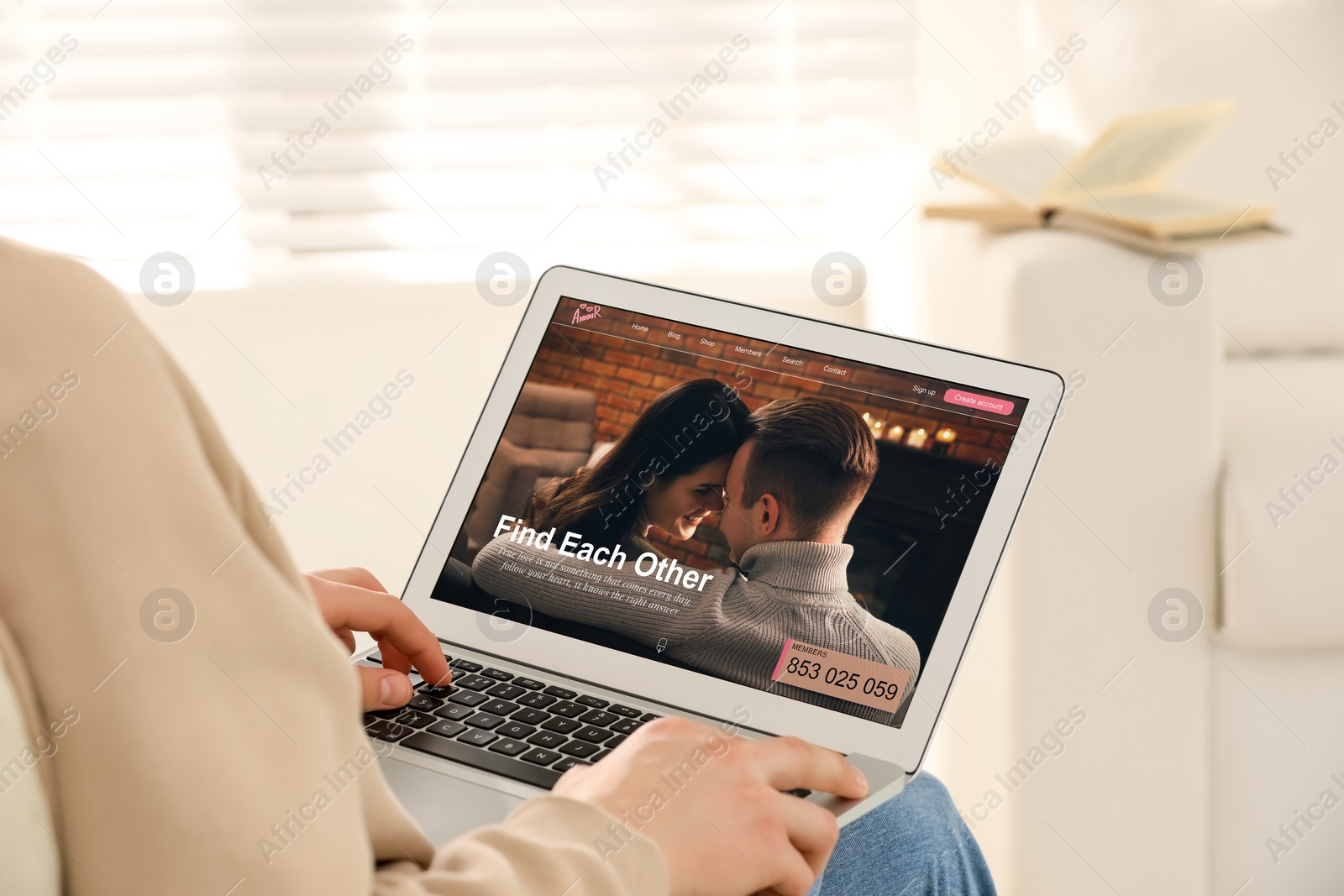 Image of Looking for partner. Man using laptop at home, closeup. Dating site webpage on device screen