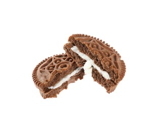 Photo of Broken tasty chocolate sandwich cookie with cream on white background