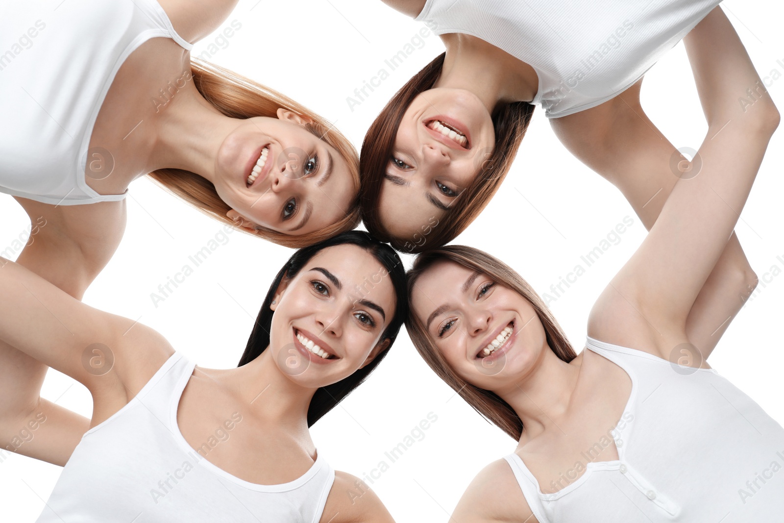 Photo of Beautiful young ladies hugging on white background, bottom view. Women's Day