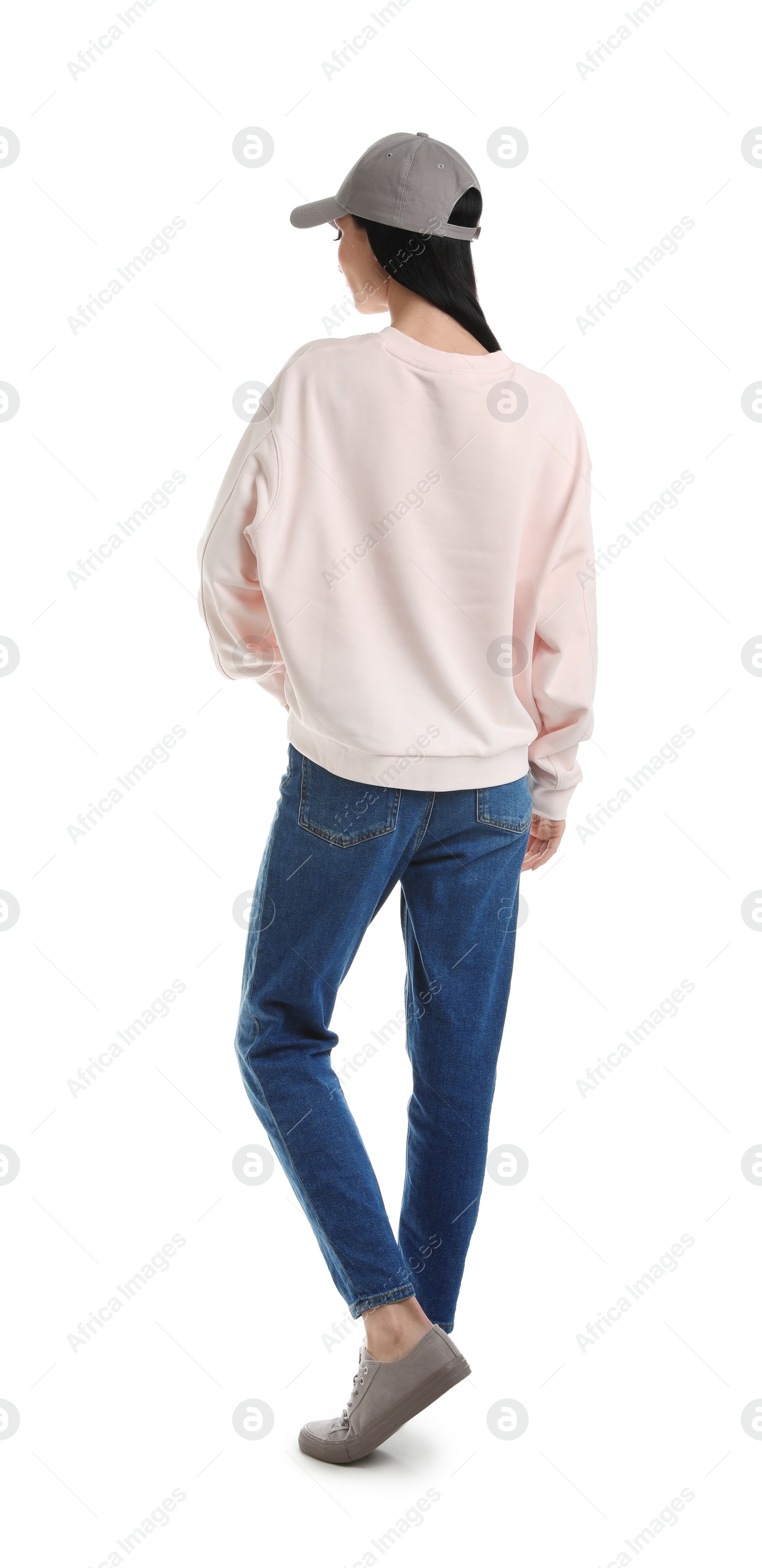 Photo of Young woman in sweater isolated on white. Mock up for design