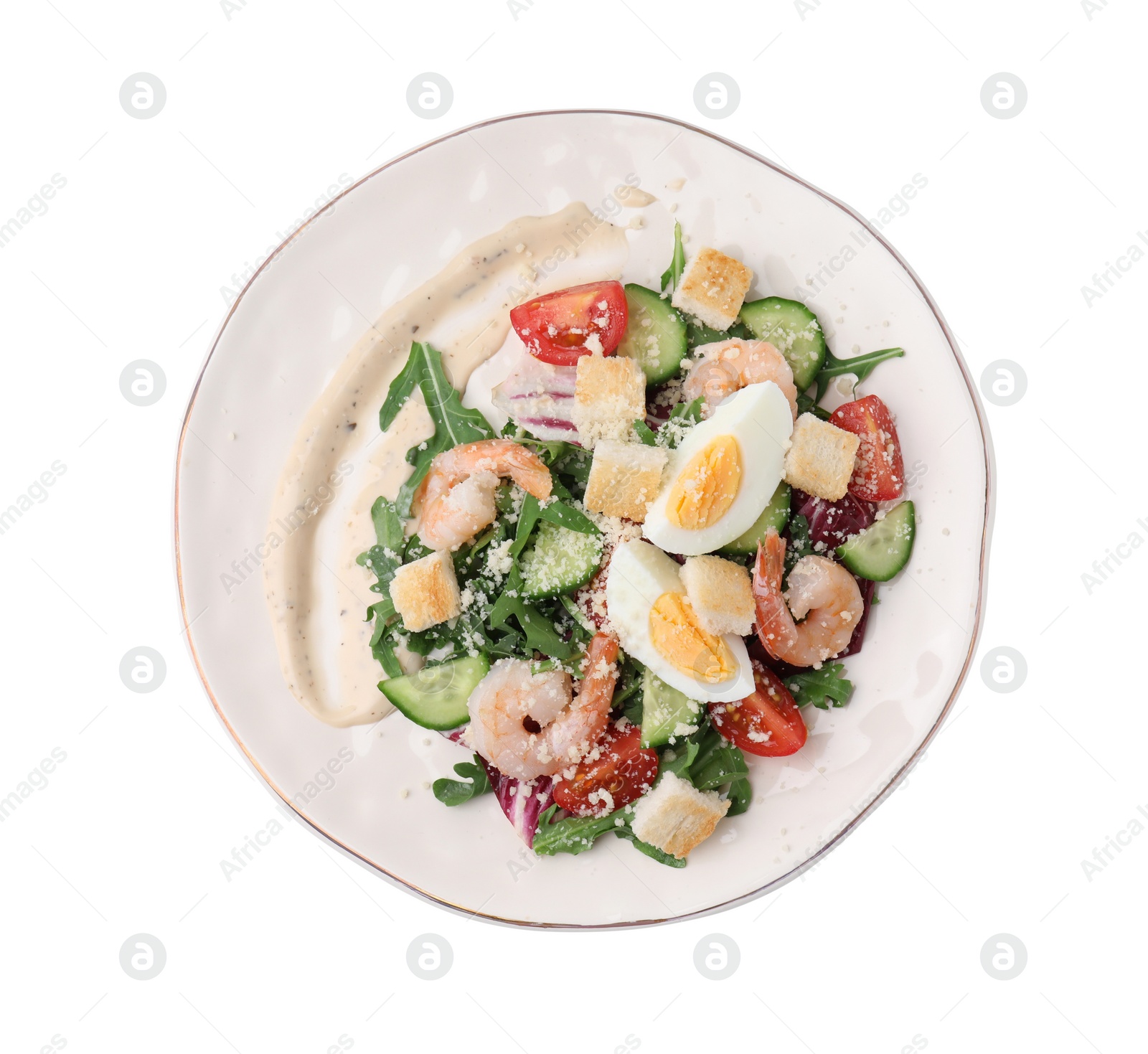 Photo of Plate of delicious Caesar salad with shrimps isolated on white, top view
