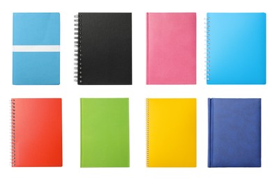 Image of Set with stylish colorful notebooks on white background, top view