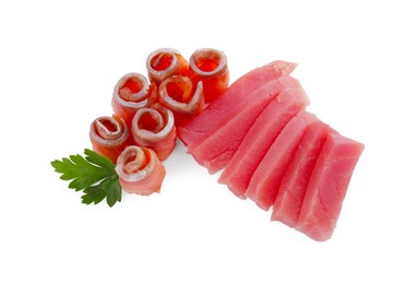 Tasty sashimi (slices of fresh raw tuna and salmon) with parsley isolated on white, above view