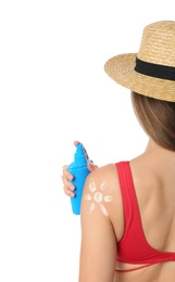 Photo of Woman with sun protection cream on body against white background, closeup