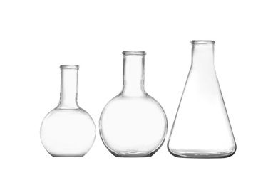 Group of empty chemistry glassware isolated on white