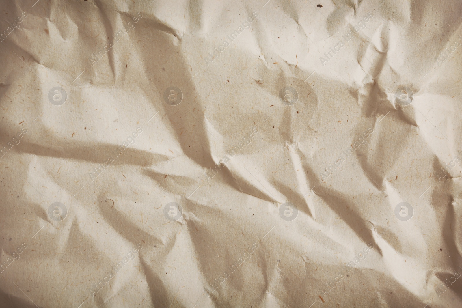 Image of Crumpled old paper as background. Texture of parchment