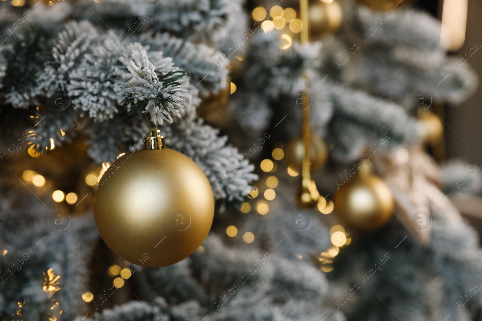 Photo of Beautiful decorated Christmas tree with baubles and lights as background, closeup