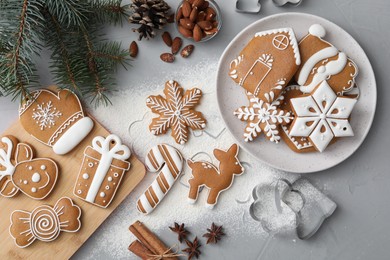 Flat lay composition with delicious homemade Christmas cookies on grey table