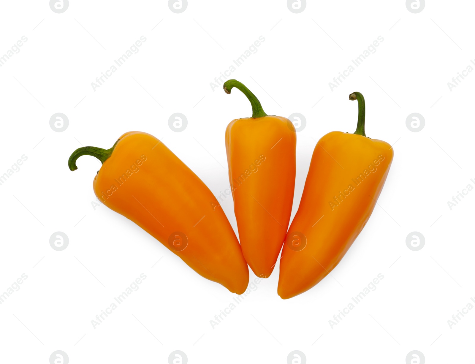 Photo of Fresh raw orange hot chili peppers on white background, top view