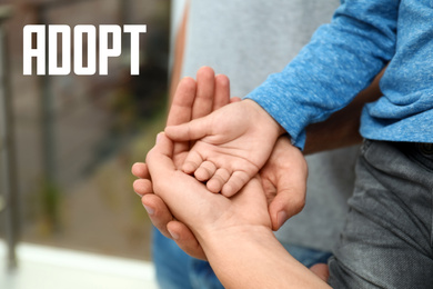 Happy family holding hands indoors, closeup. Child adoption concept