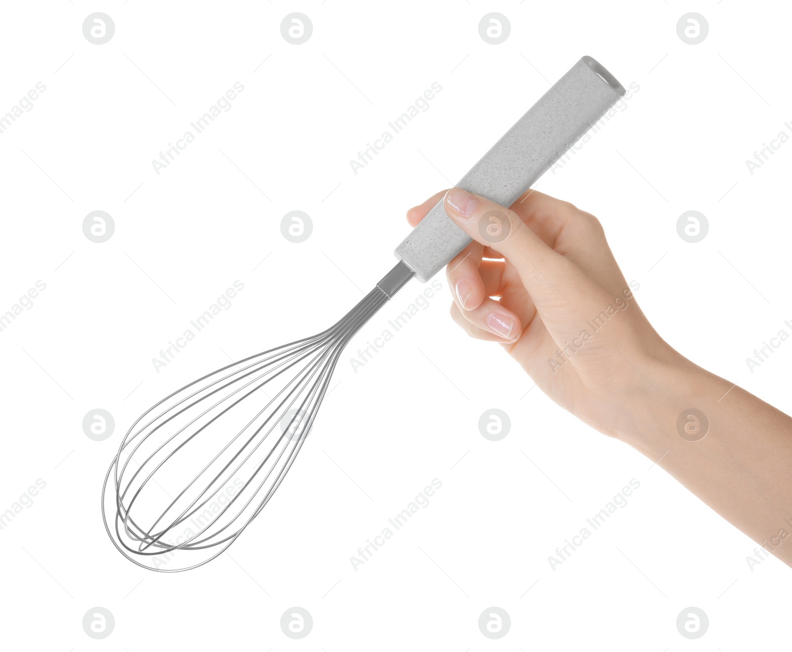 Photo of Woman holding metal whisk on white background, closeup