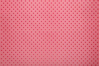 Photo of Polka dot wrapping paper as background, top view