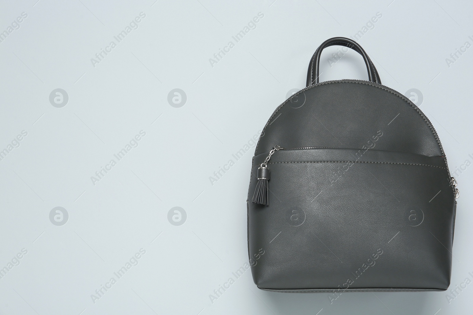 Photo of Stylish urban backpack on white background, top view